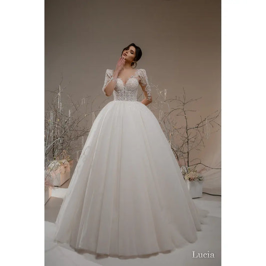 Rochie mireasa printesa cu decolteu in V si maneci lungi – Lucia - Simone Boutique rochii de mireasa Sibiu