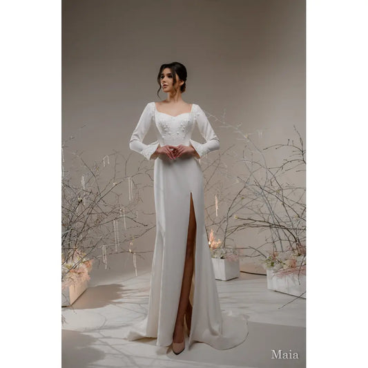 Rochie mireasa sirena de tafta cu crapatura pe picior si maneci lungi – Maia - Simone Boutique rochii de mireasa Sibiu